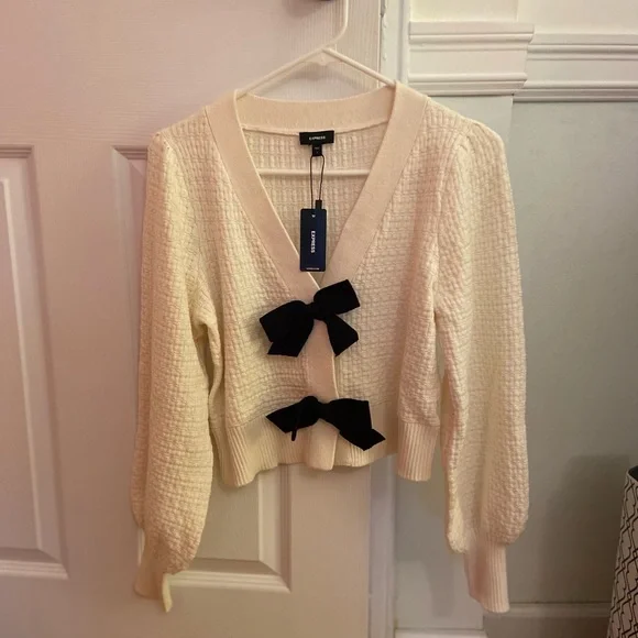 CARDIGAN WITH BOWS CLOSURE